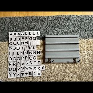 Letter board with hooks